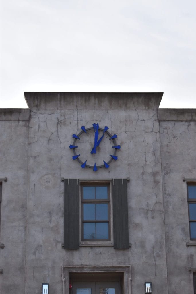 Showcasing a custom clock manufactured for an apartment building in charleston south carolina
