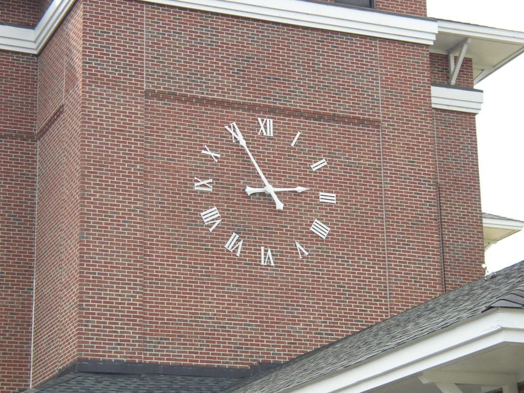 A marker Clock installed on a building