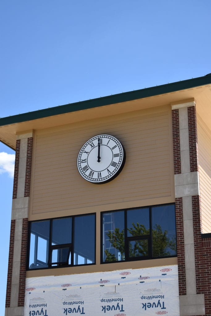 A canister Clock after being installed on a new building