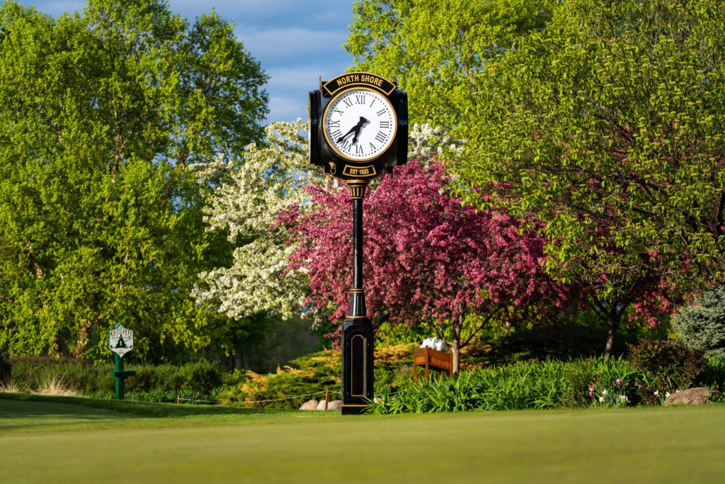 Another andmark on a Golf Course of a Howard Four Face Replica 16 foot Post Clock in Milwaukee.